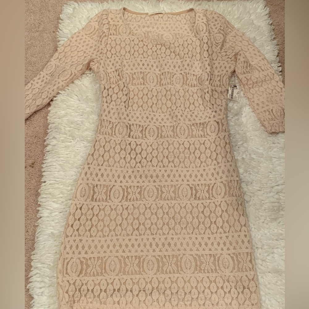 Never worn and still have tag Sexy back casual dress - with heels or boots